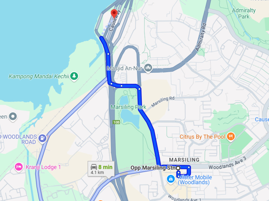 Take Bus 950 from Opps Marsiling Station to Woodlands Checkpoint